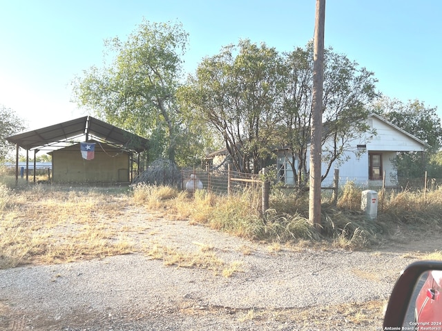 view of yard with a carport