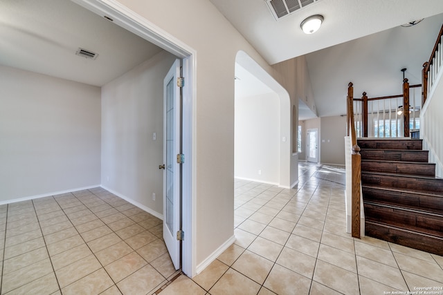 interior space featuring light tile patterned flooring