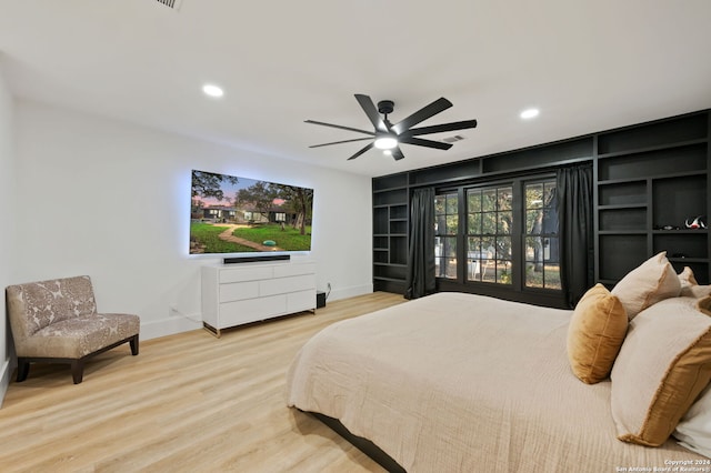 bedroom featuring ceiling fan and light hardwood / wood-style floors