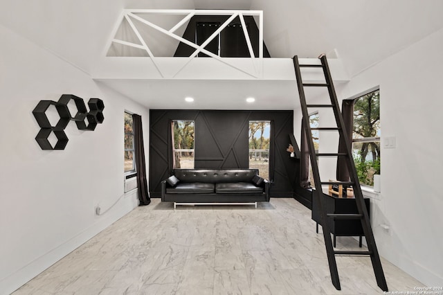 living area featuring a wealth of natural light