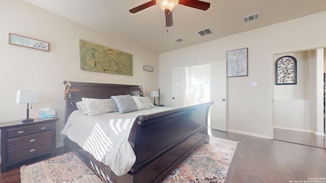 bedroom featuring ceiling fan and dark hardwood / wood-style floors