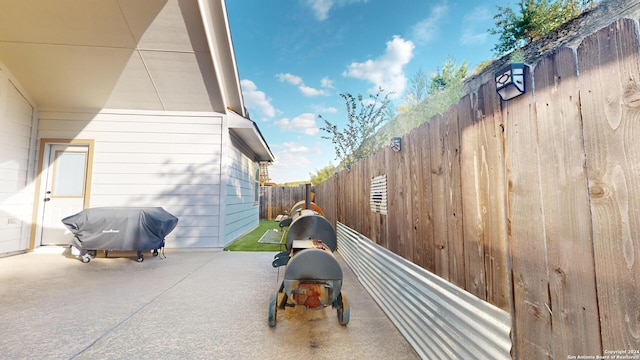 view of patio / terrace featuring a grill