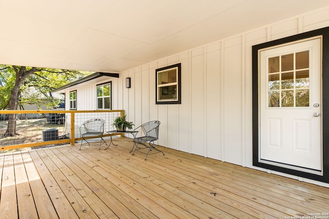 wooden terrace with central AC unit