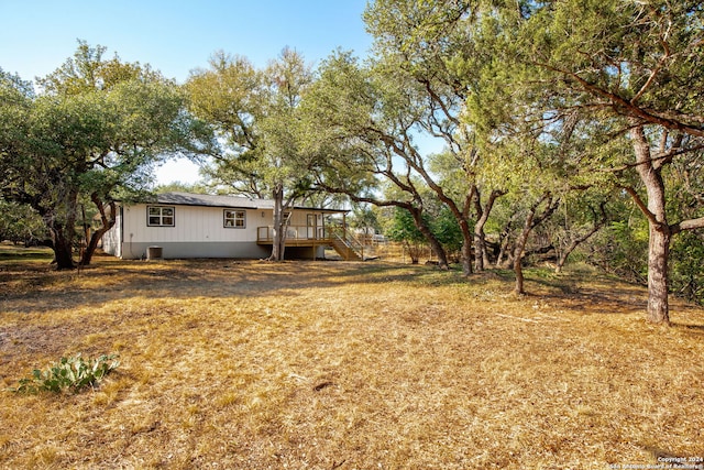 view of yard with a deck