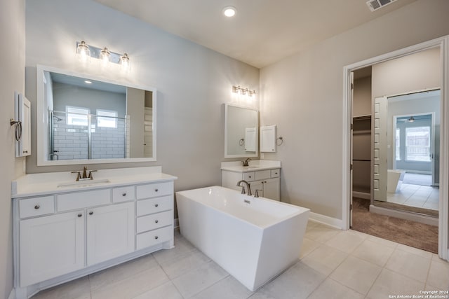 bathroom featuring tile patterned floors and vanity