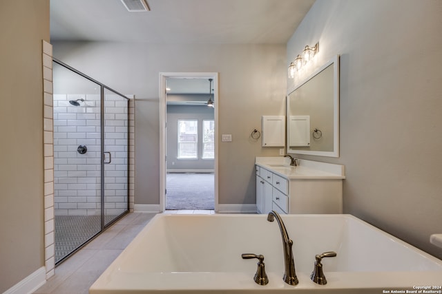 bathroom featuring vanity and plus walk in shower