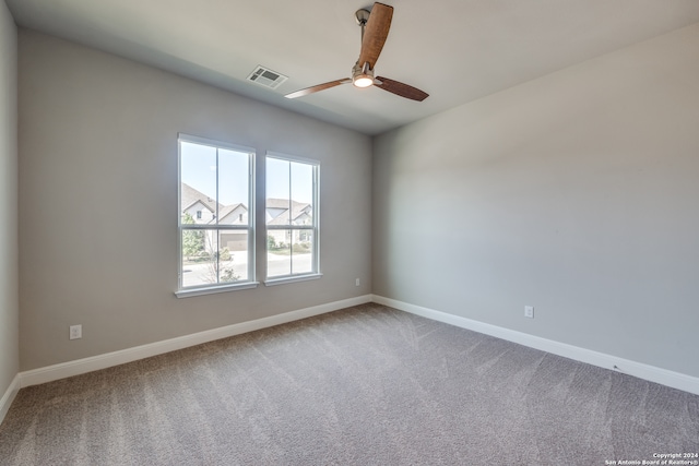 unfurnished room featuring carpet flooring and ceiling fan