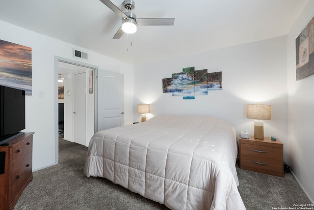 carpeted bedroom with ceiling fan