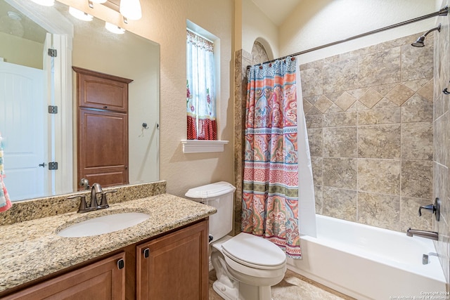 full bathroom with vanity, toilet, and shower / bath combo