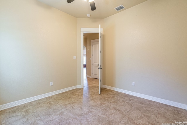 spare room featuring ceiling fan