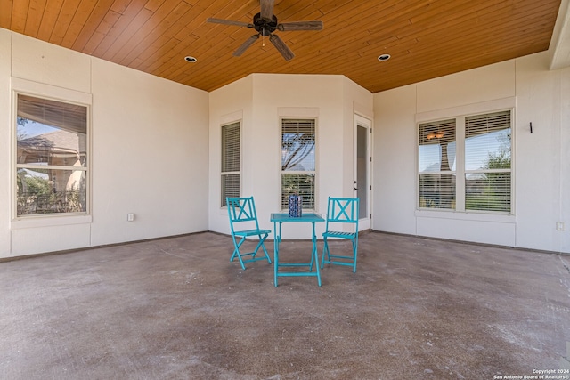 view of patio featuring ceiling fan