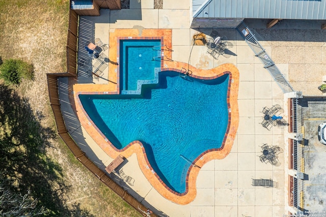 view of pool with a patio area