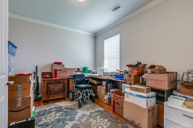 office space featuring hardwood / wood-style flooring and crown molding