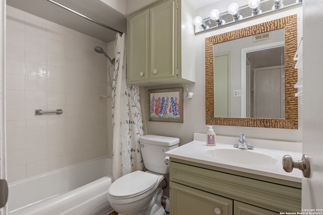 full bathroom with shower / bath combo with shower curtain, vanity, and toilet