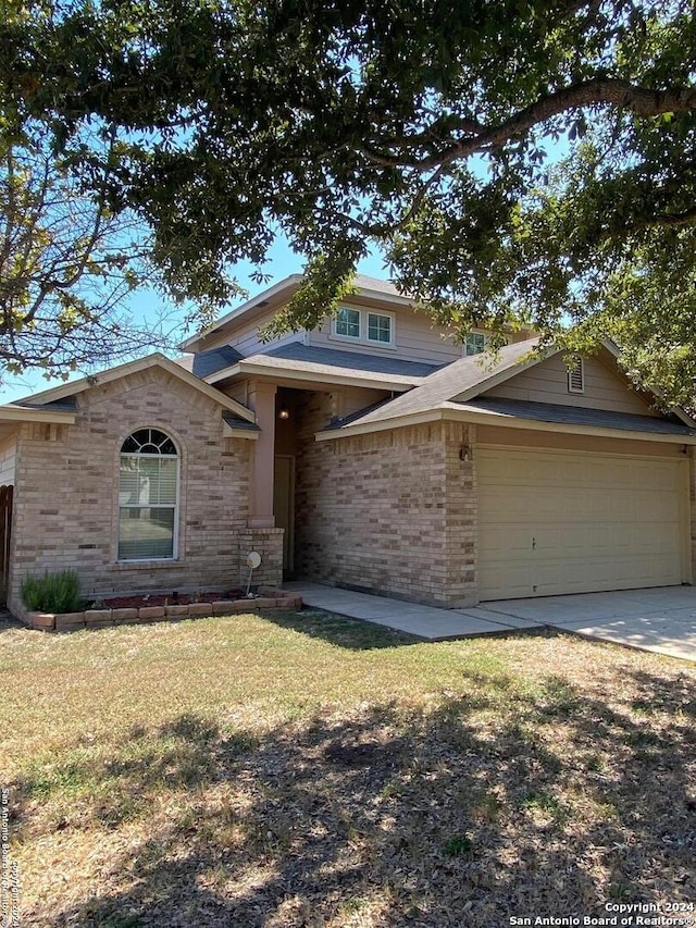 view of front of home with a garage