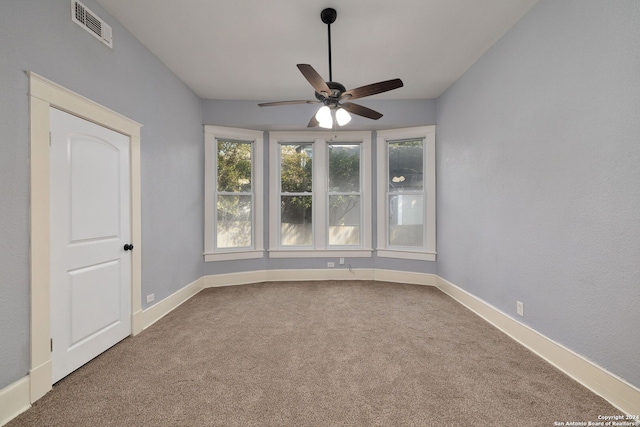 722 E Drexel Ave, San Antonio, TX 78210 - carpeted spare room featuring a ceiling fan and baseboards