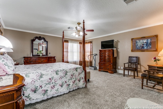 bedroom featuring ornamental molding, carpet, a textured ceiling, and ceiling fan