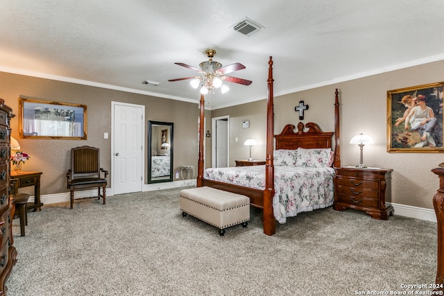 bedroom featuring ceiling fan, a textured ceiling, crown molding, and carpet