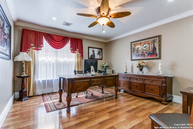 office with ceiling fan, light hardwood / wood-style flooring, and ornamental molding