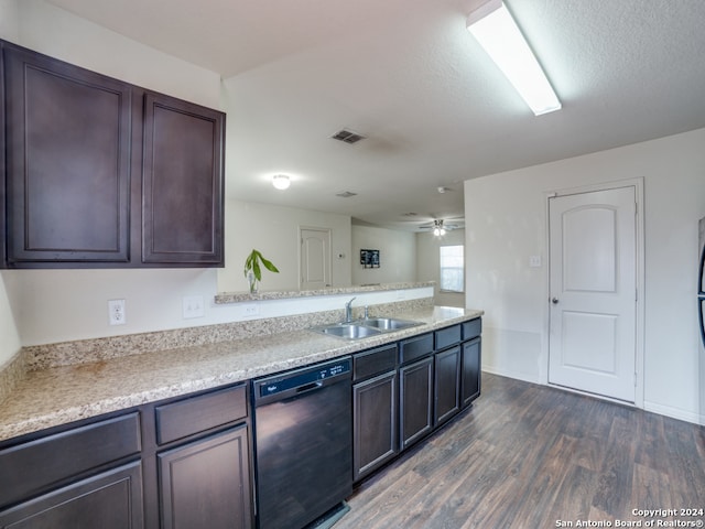 kitchen featuring ceiling fan, black dishwasher, dark brown cabinetry, sink, and dark hardwood / wood-style floors