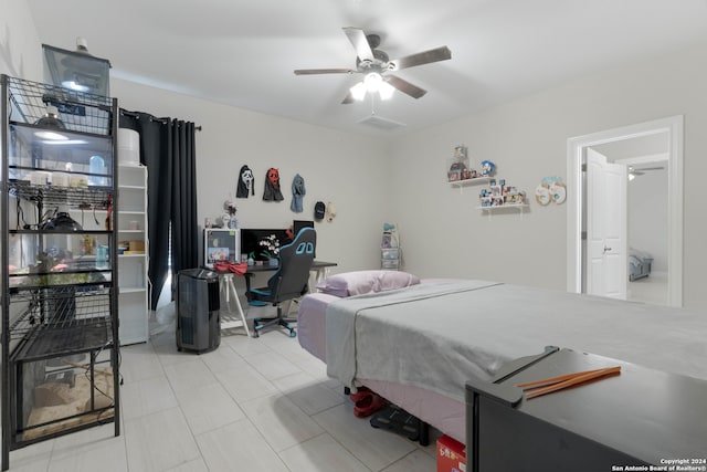 bedroom featuring tile patterned flooring and ceiling fan