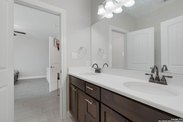 120CHAMPIONSB Champions Blvd, La Vernia, TX 78121 - full bath with double vanity, visible vents, baseboards, and a sink