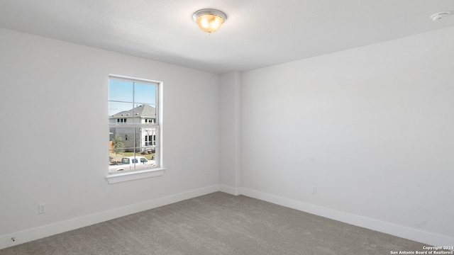 view of carpeted spare room