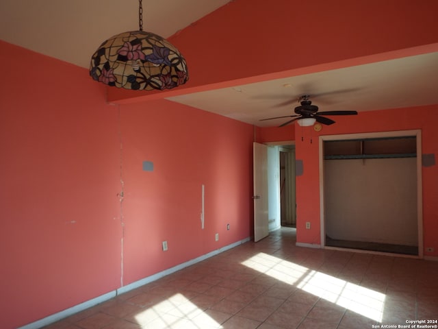 unfurnished bedroom with a closet and light tile patterned floors