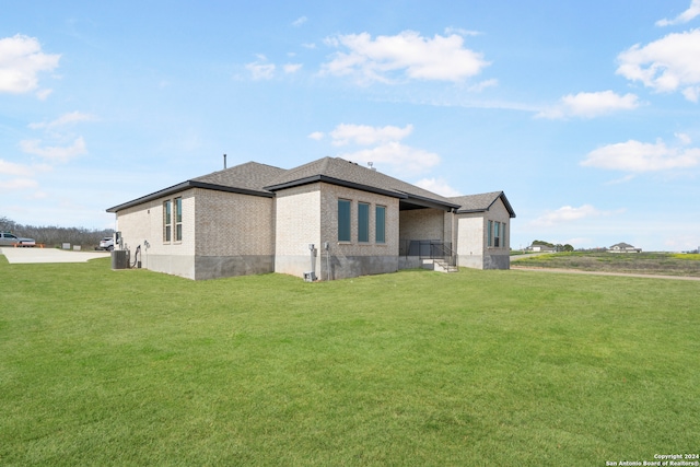 view of home's exterior featuring a yard