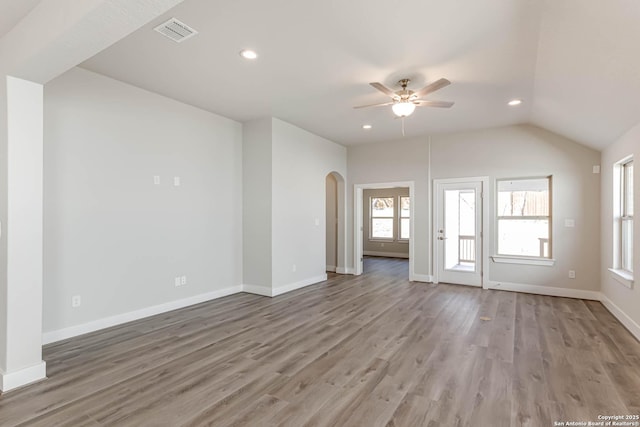 interior space featuring lofted ceiling, hardwood / wood-style floors, and ceiling fan