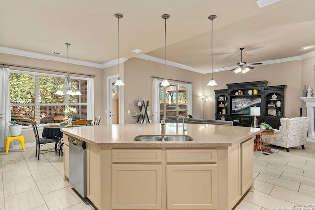 kitchen with a sink, a center island with sink, open floor plan, and light stone countertops