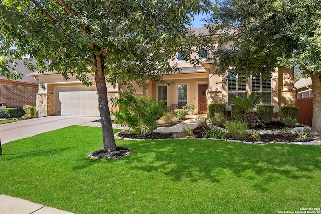 obstructed view of property featuring a front lawn, stone siding, stucco siding, concrete driveway, and an attached garage