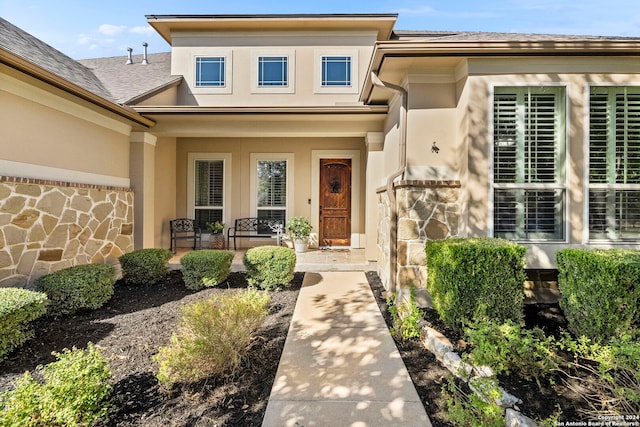 entrance to property with a porch