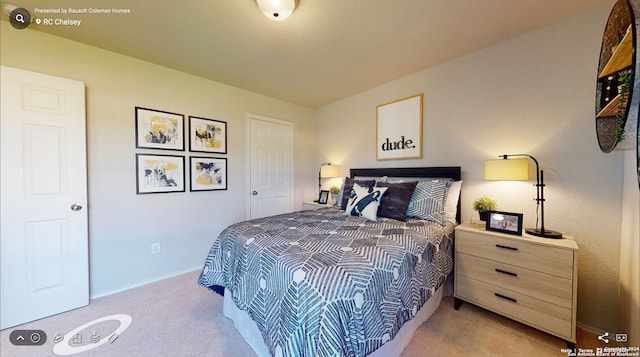 bedroom featuring light carpet