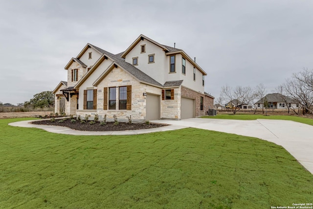 view of front of property with a garage, central AC unit, and a front yard