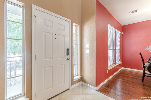 foyer featuring light wood-type flooring