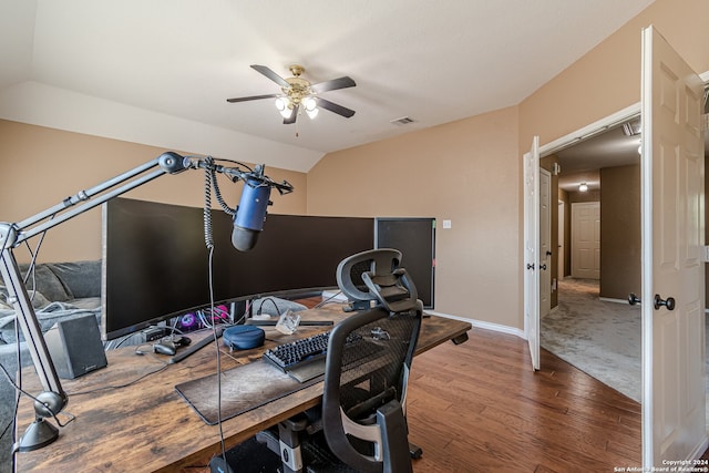 office area with ceiling fan, lofted ceiling, and hardwood / wood-style flooring