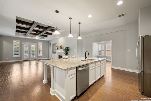 kitchen featuring white cabinets, sink, a center island with sink, stainless steel appliances, and dark hardwood / wood-style flooring