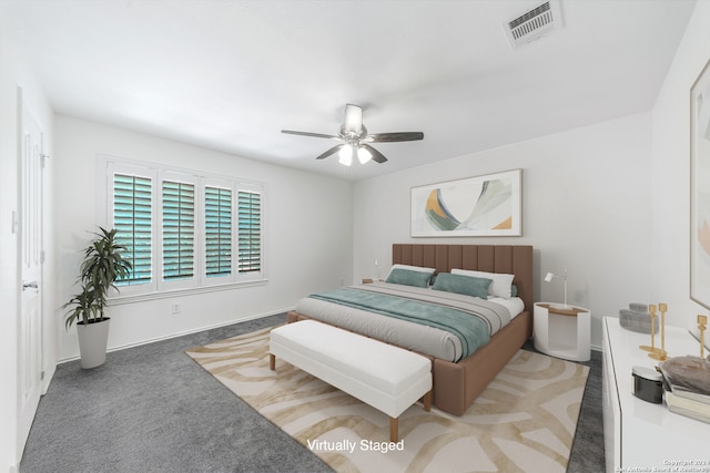 bedroom featuring ceiling fan and carpet floors