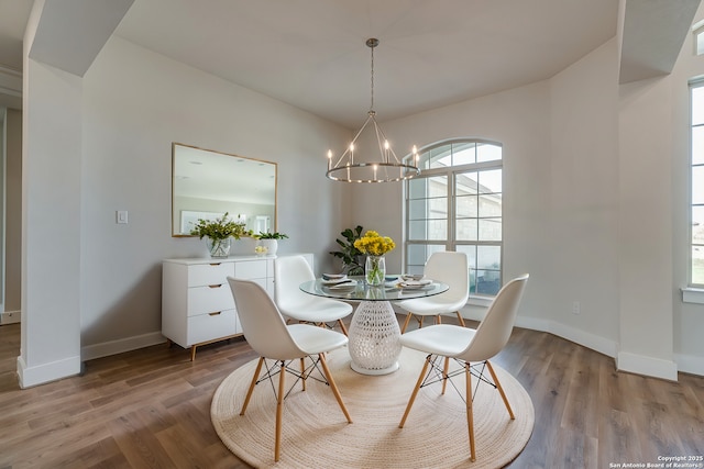 5014 Estates Oak Way, San Antonio, TX 78263 - dining room with baseboards, a chandelier, and wood finished floors