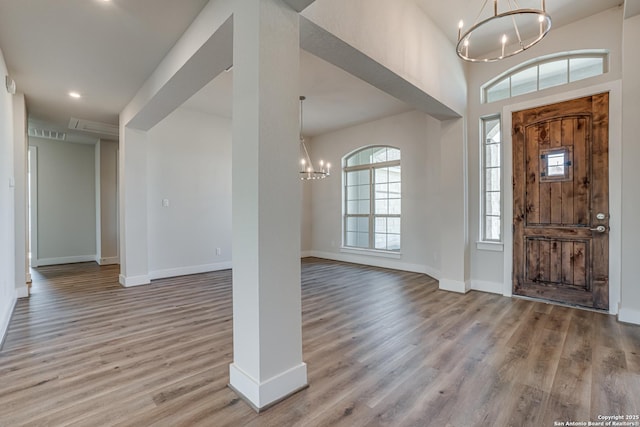 5014 Estates Oak Way, San Antonio, TX 78263 - foyer entrance with a chandelier, wood finished floors, and baseboards