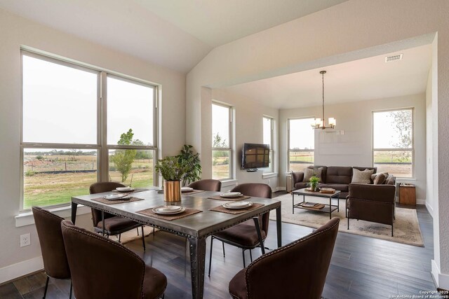 5306 Estates Oak Way, San Antonio, TX 78263 - kitchen with a stone fireplace, beamed ceiling, dark wood-type flooring, and plenty of natural light