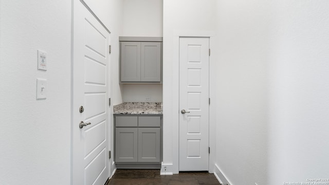 interior space with dark hardwood / wood-style flooring