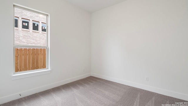 empty room with carpet floors