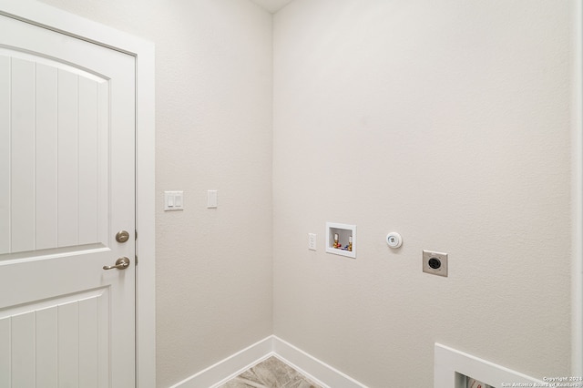 laundry area with hookup for a gas dryer, hookup for an electric dryer, and hookup for a washing machine