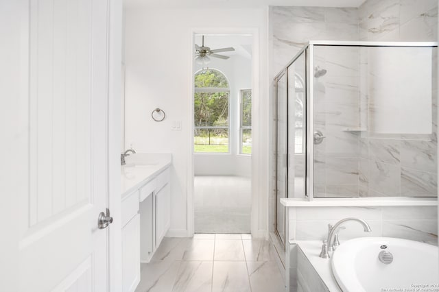 bathroom with vanity, shower with separate bathtub, vaulted ceiling, and ceiling fan