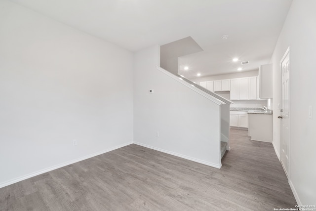 unfurnished room featuring light hardwood / wood-style flooring