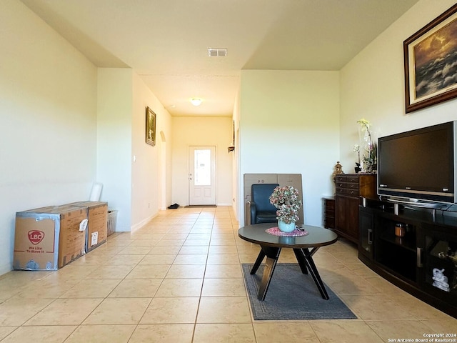 sitting room with light tile patterned floors