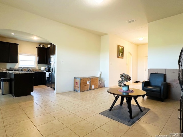 living room with light tile patterned floors