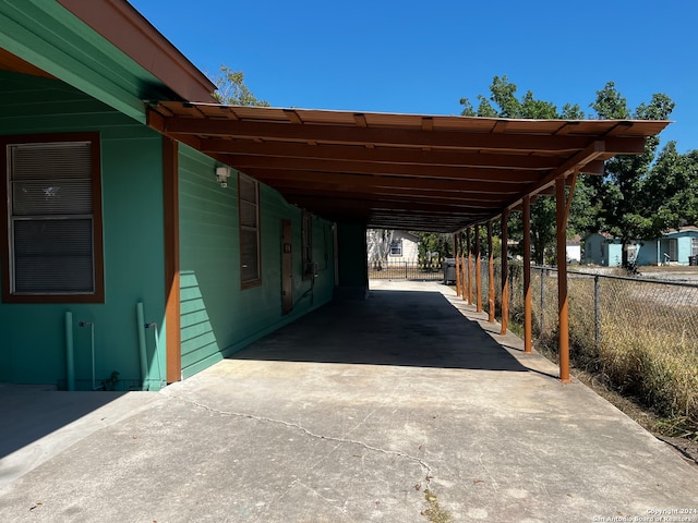 view of car parking featuring a carport